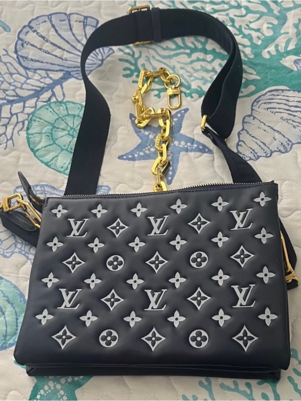 Louis Vuitton Black Quilted Monogram Crossbody with Gold Chain Accent
FIRM!!